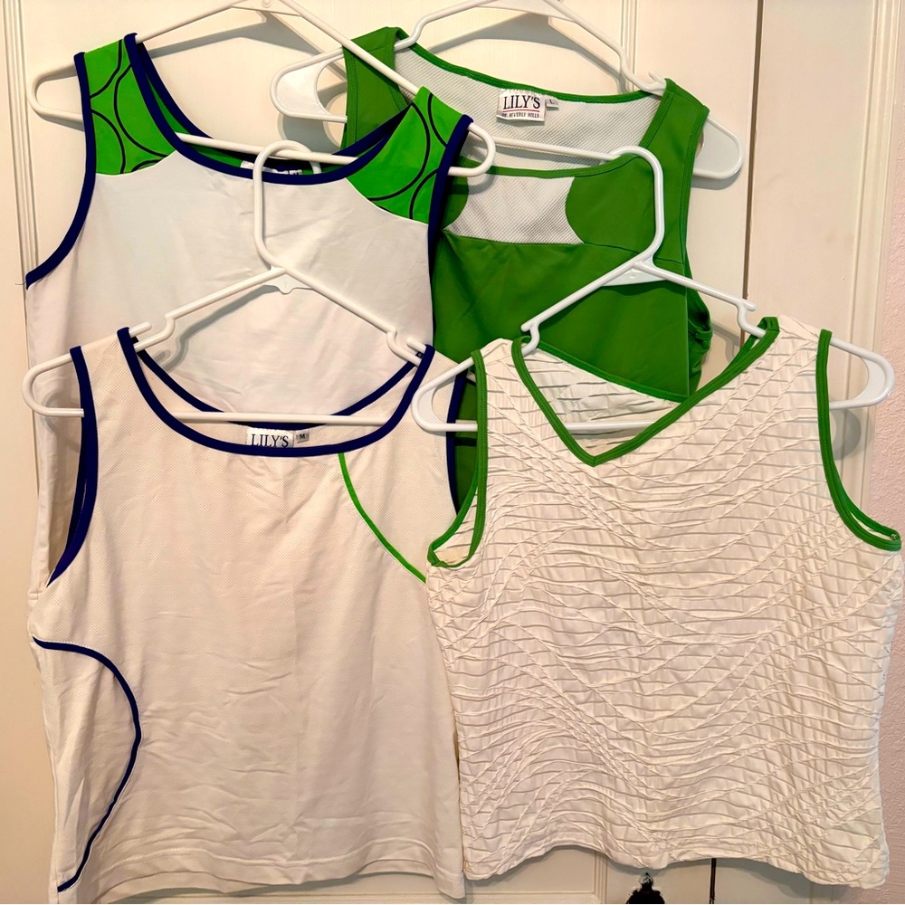 6 piece Tennis set. 4 tank tops and 2 bottoms (1 short, 1 skirt)